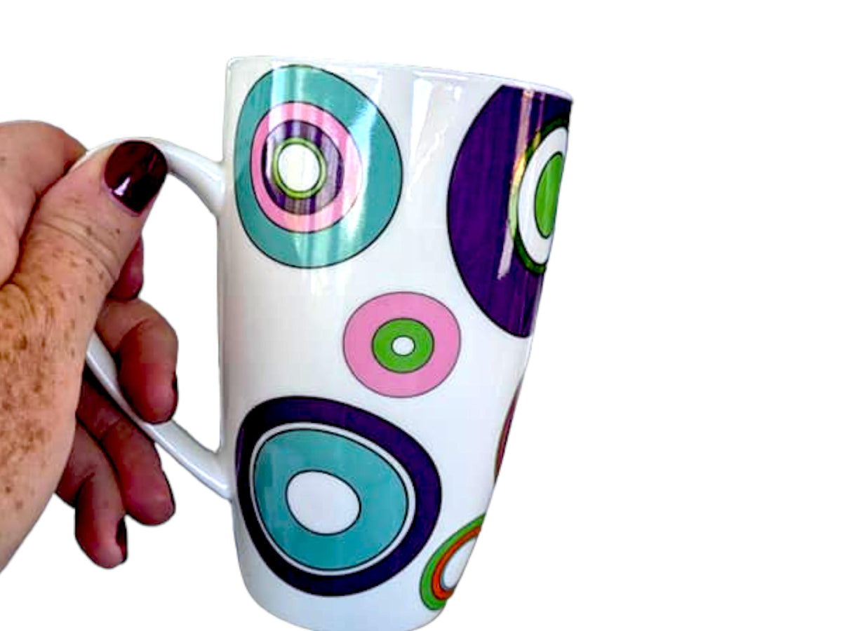 Retro Circle Mugs: Brightly Colored Ceramic Pair